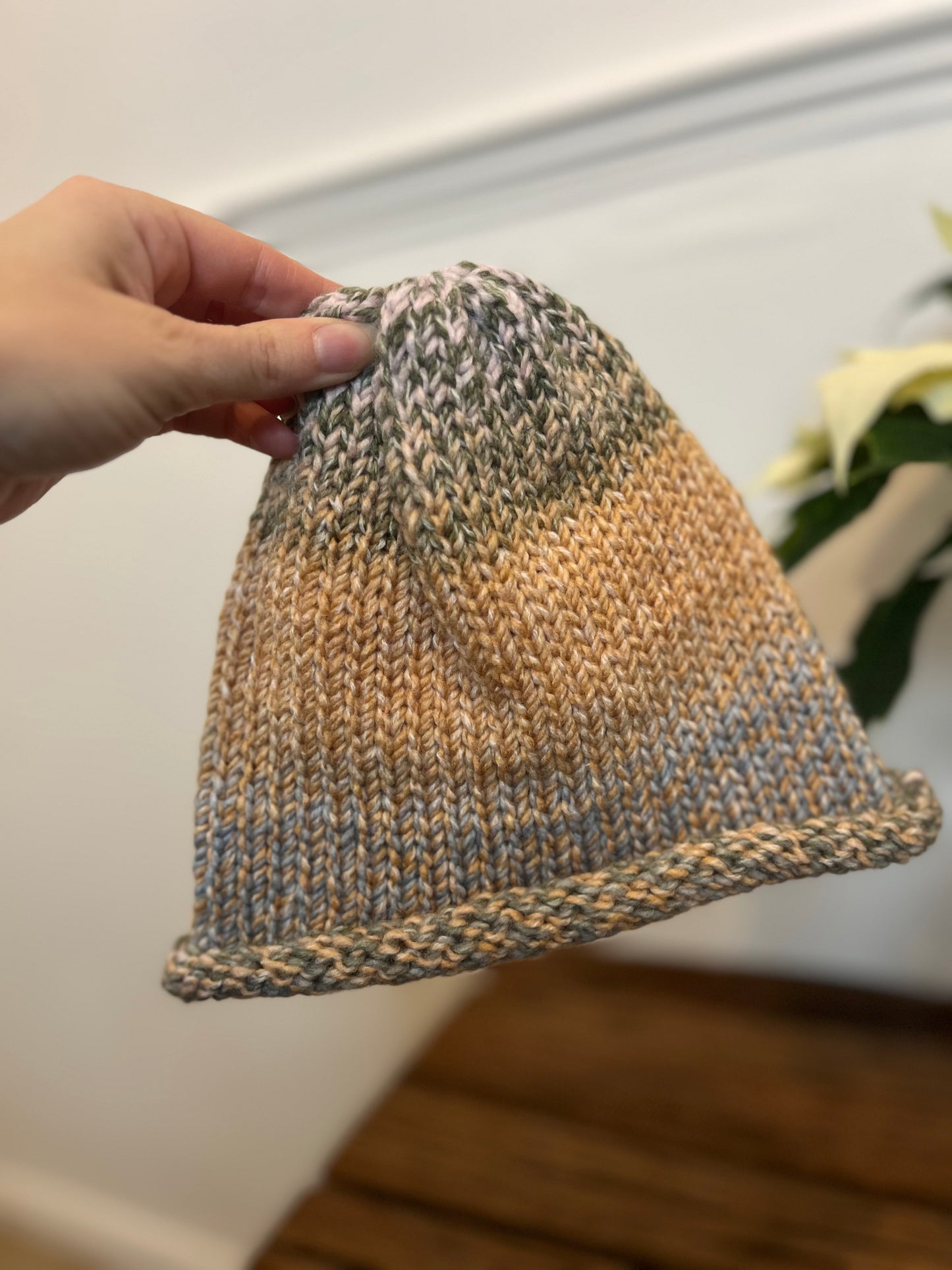 Hand knitted roll hem hat