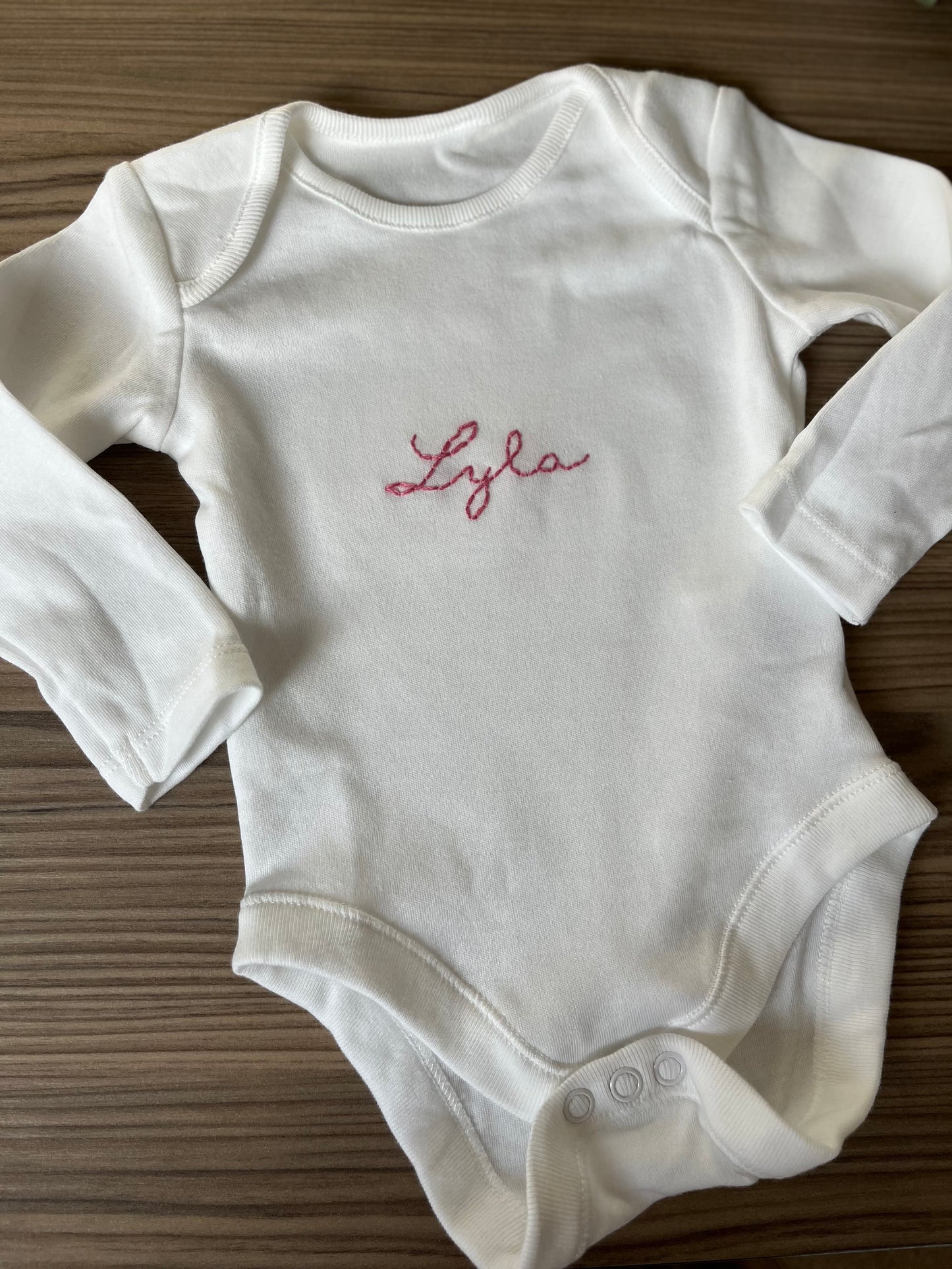 Personalised long sleeved 100% cotton baby grow